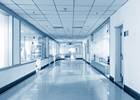 Commercial Janitorial Services use approved cleaners to keep hallways, rooms, and medical offices clean